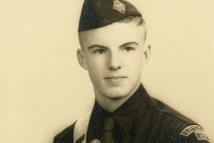 Jim Guy Tucker in Boy scout uniform