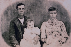 Guy Beckwith Tucker and Martha McCain Tucker holding children, Ruby Guepel and James Guy Tucker, Sr.