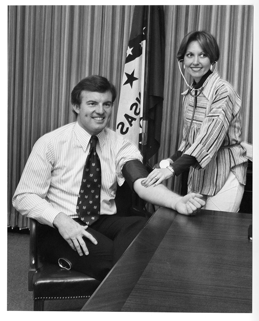 Jim Guy Tucker with nurse, supporting program for detecting high blood pressure Jim Guy Tucker with nurse, supporting program for detecting high blood pressure