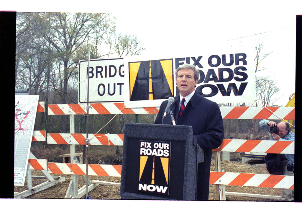 Jim Guy Tucker at outdoor event for "Fix Our Roads Now" event Jim Guy Tucker at outdoor event for "Fix Our Roads Now" event