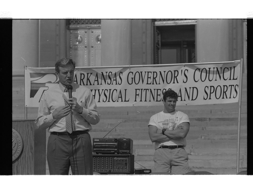 Jim Guy Tucker at outdoor event for Arkansas Governor's Council on Physical Fitness and Sports Jim Guy Tucker at outdoor event for Arkansas Governor's Council on Physical Fitness and Sports