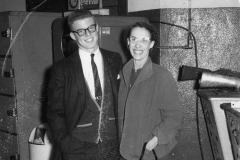 Jim Guy Tucker standing next to a woman