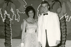 Jim Guy Tucker in a tuxedo with formally-dressed date at Hall High School prom, Little Rock, 1961