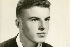 Portrait of Jim Guy Tucker as a teenager