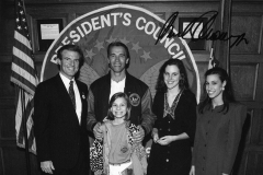 Jim Guy Tucker and family with Arnold Schwarzenegger