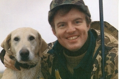 Jim Guy Tucker duck hunting with dog in postcard for U.S. Senate