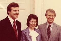 Jim Guy Tucker and others posing with Jimmy Carter in Oval Office