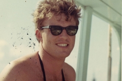 Jim Guy Tucker on boat