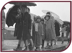 Back and white photograph of children leaving the grade school at Jerome