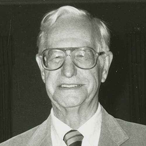 Black and white headshot of Roy Kumpe