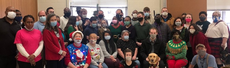 Staff wearing face masks in the group holiday picture, 23 December 2020