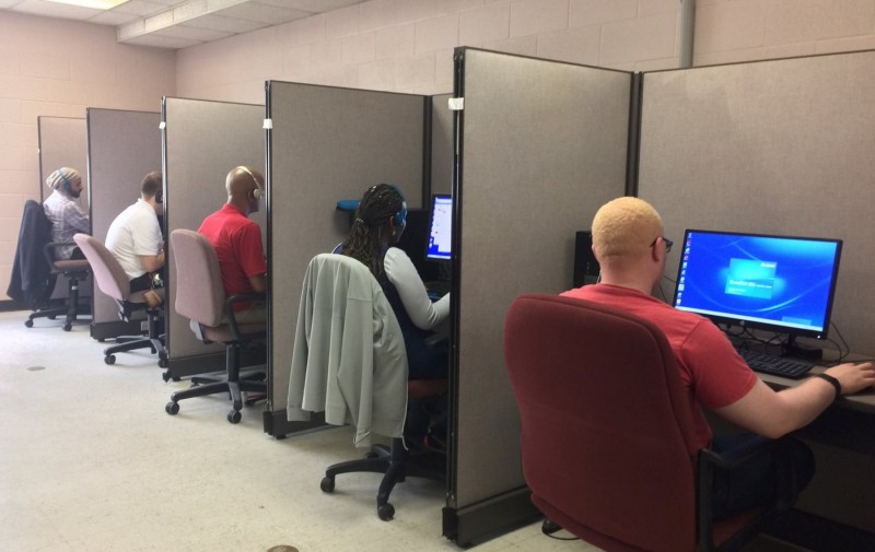 Clients in the Credit Counseling program working on computers, 28 February 2017