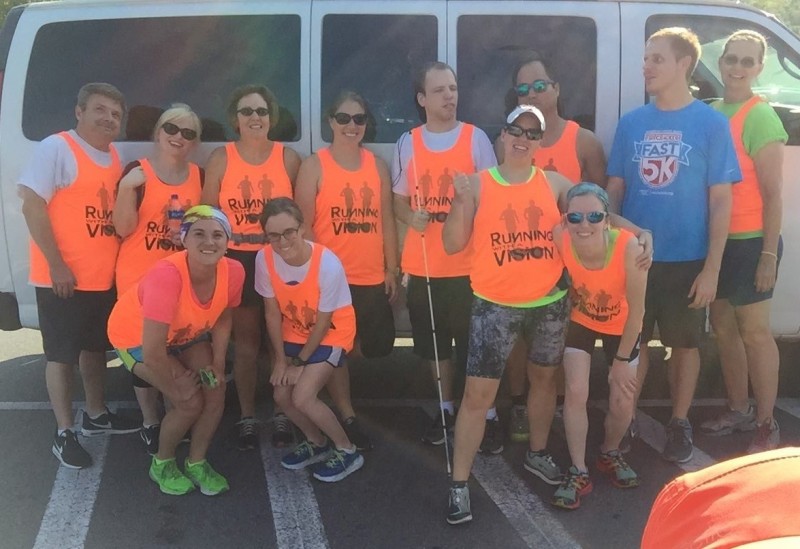 The WSB running/walking club posing after their run at Two Rivers Bridge, 18 July 2017